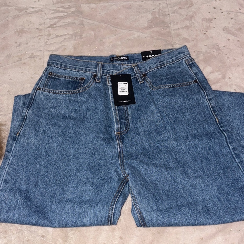 Woman’s crossover straight leg jeans